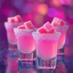pink starburst shot with glitter sugar rim and candy cubes